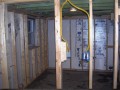 Framing of room divisions as basement apartment takes shape at home on Wisconsin Ave. NW near Washington National Cathedral.