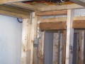 Framing of room divisions for basement apartment at home on Wisconsin Ave. NW near Washington National Cathedral.