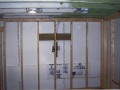 Wiring for plasma TV in basement remodel at home on Wisconsin Ave. NW near Washington National Cathedral.